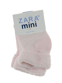 Розовые носочки для новорожденного ребенка